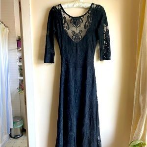 For Love and Lemons black backless lace dress. Never worn, purchased used.